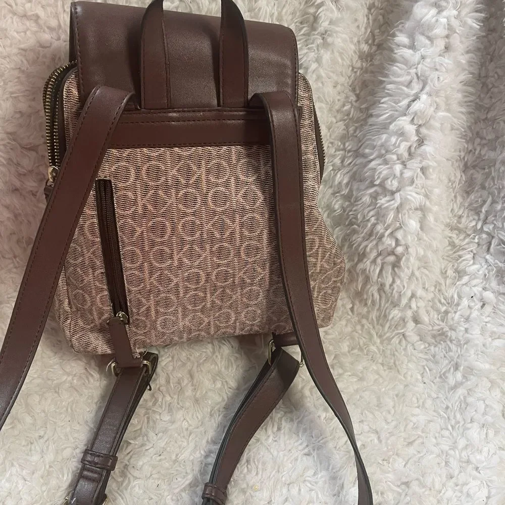 Calvin Klein Tan and Brown Logos  small Backpack logo tone hardwares.